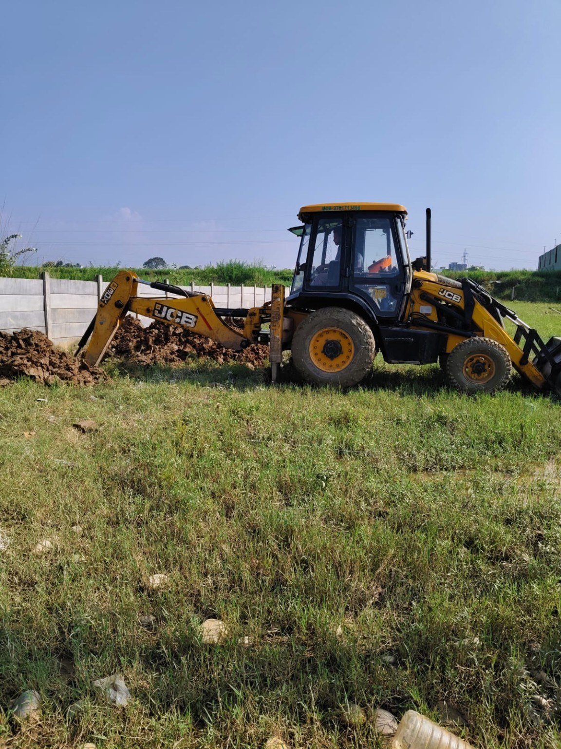 JCB excavation and site preparation work for building construction